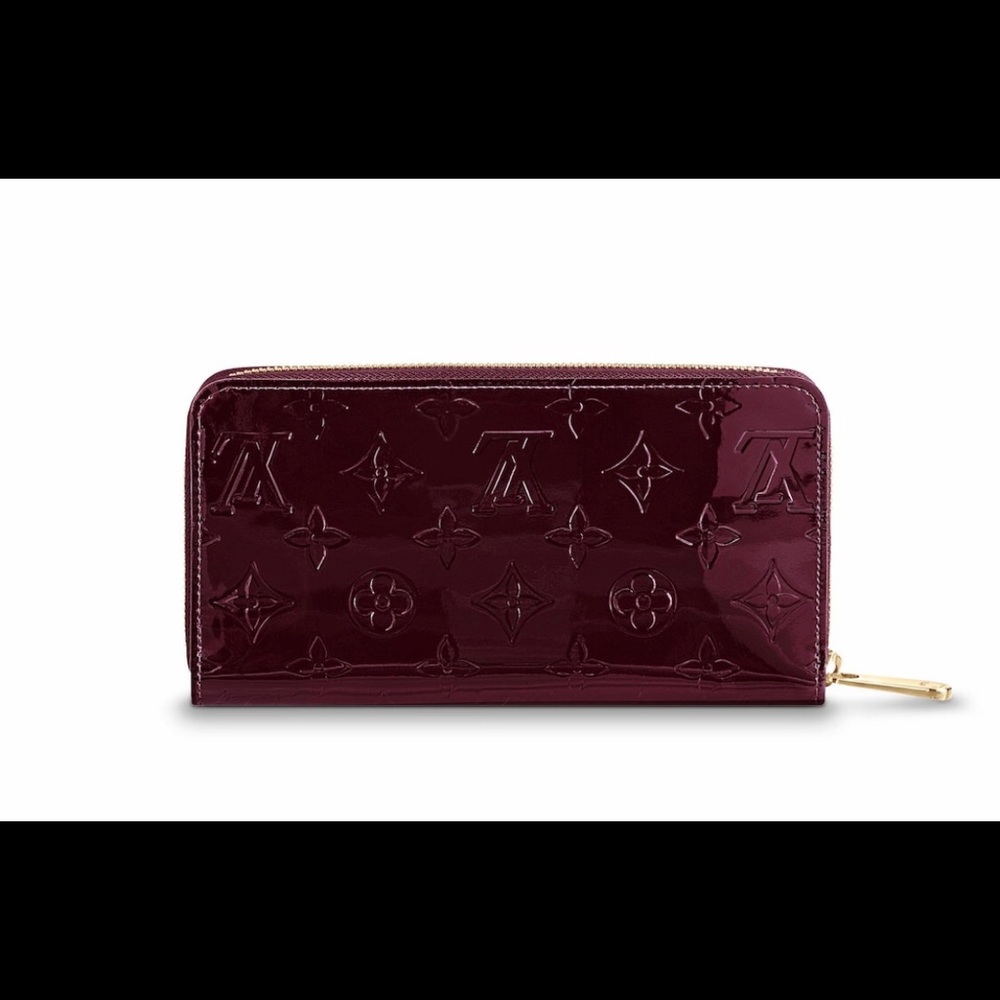 Louis Vuitton zippy wallet.